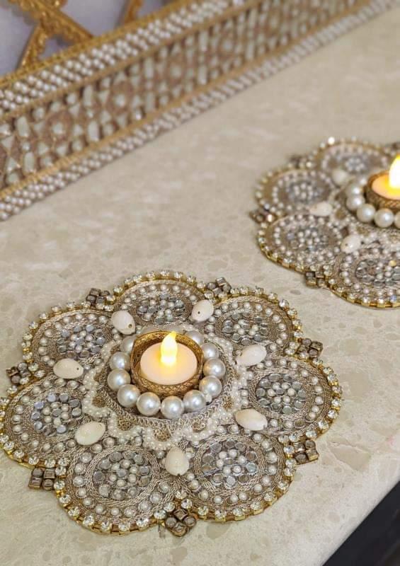 Pearl and Diamond and Stone Studded Silver Rangoli Diya Plate